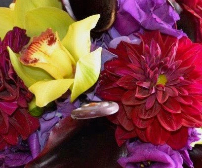 A floral arrangement of flowers that are for romance or anniversary that could include roses, lilies, orchids or hydrangea from a local flower shop in Belmar, New Jersey Gig Morris Florist