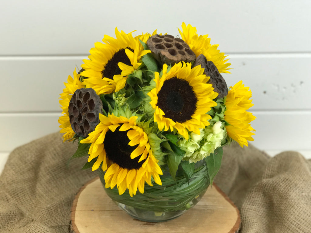 compact vase of sunflowers for the fall