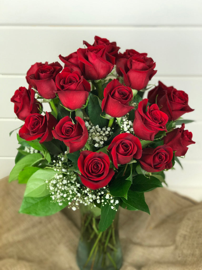 Roses in a vase from a local flower shop in Belmar, New Jersey Gig Morris Florist