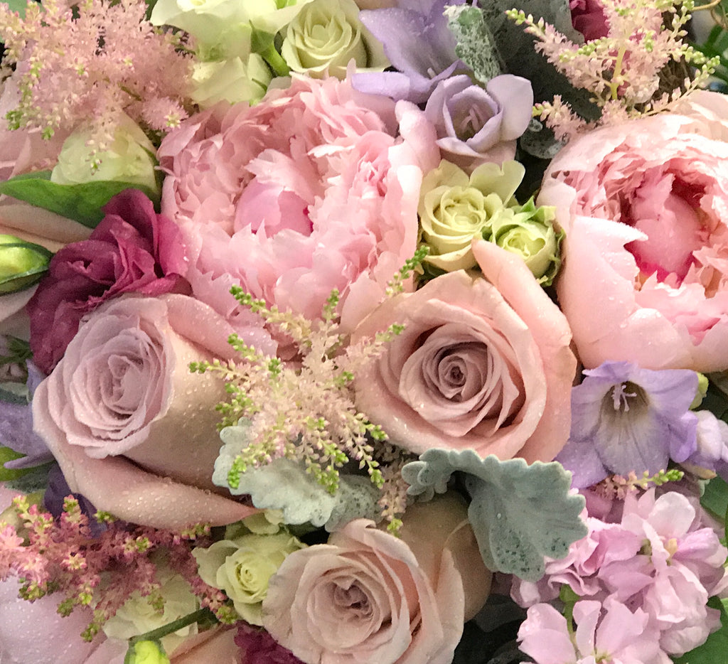 girly, feminine colors including pink, blush, lavender, purple, white and cream flowers